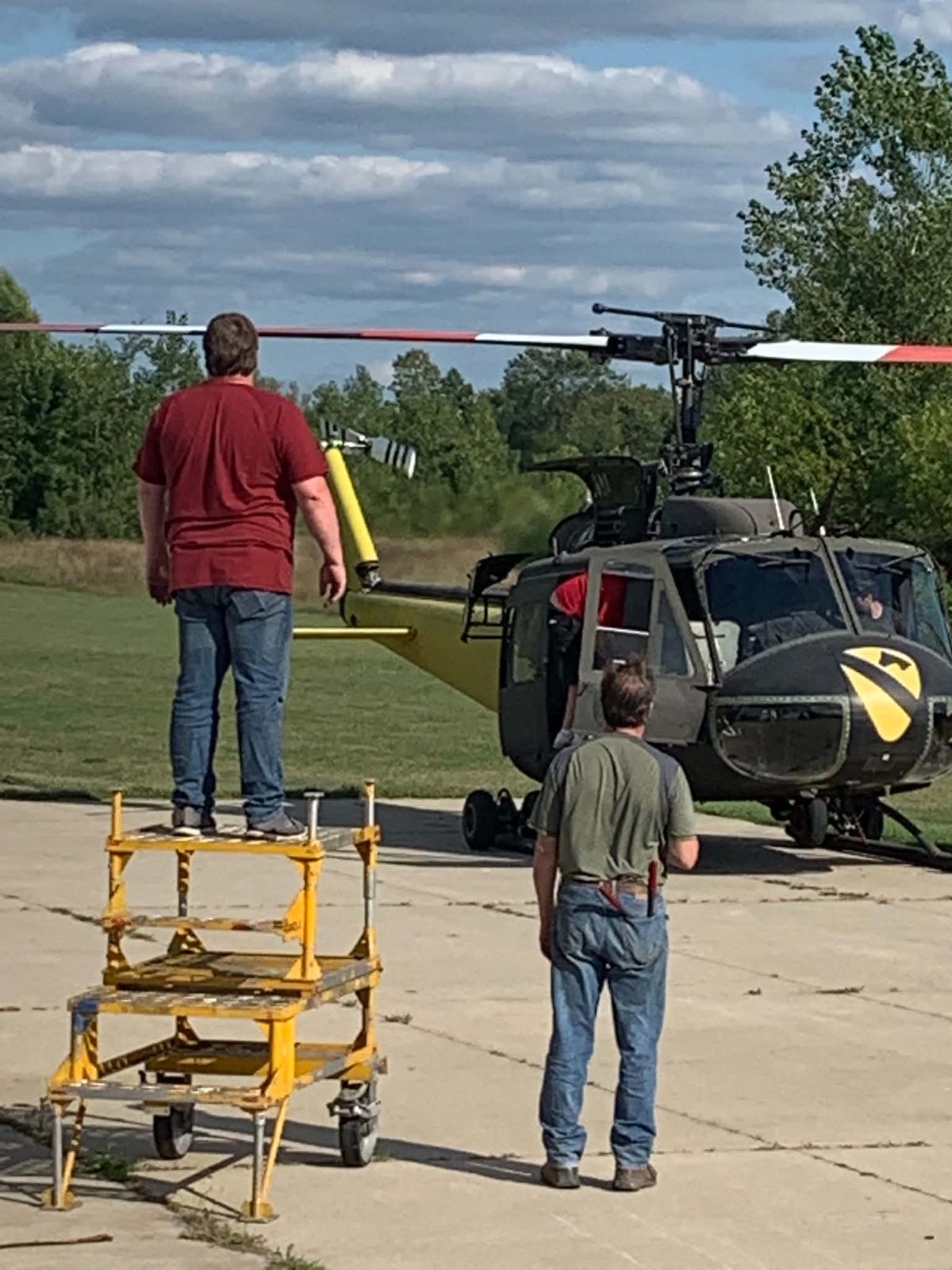 GLH technicians working on a UH-1